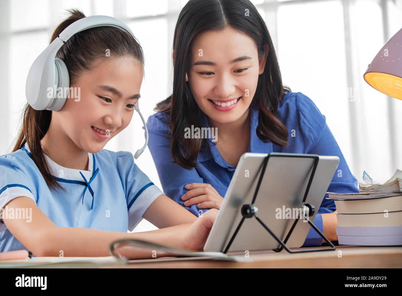 The teacher and students one-on-one online education Stock Photo