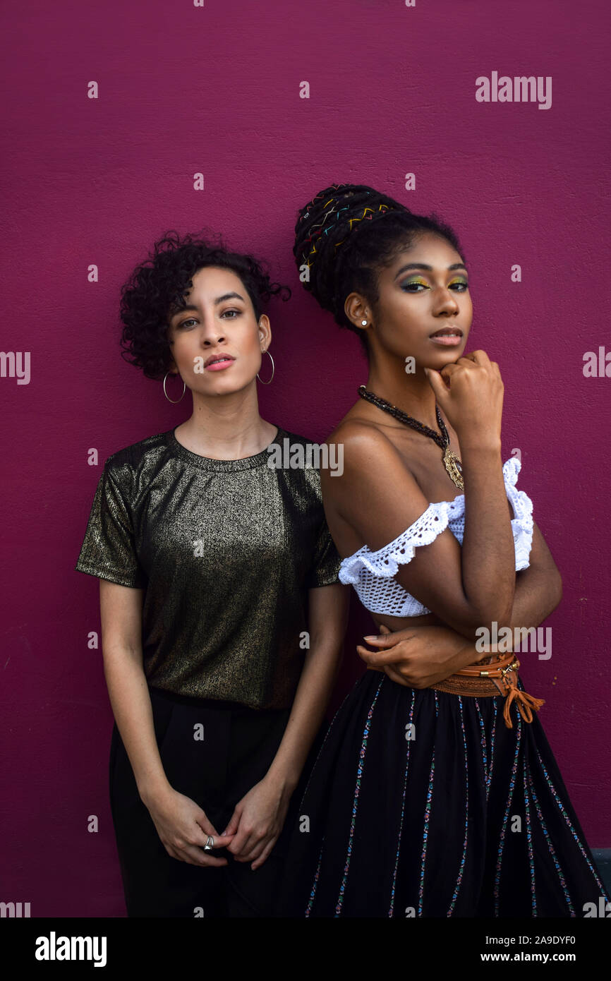 Two latin young women in the streets of Cali, Colombia Stock Photo