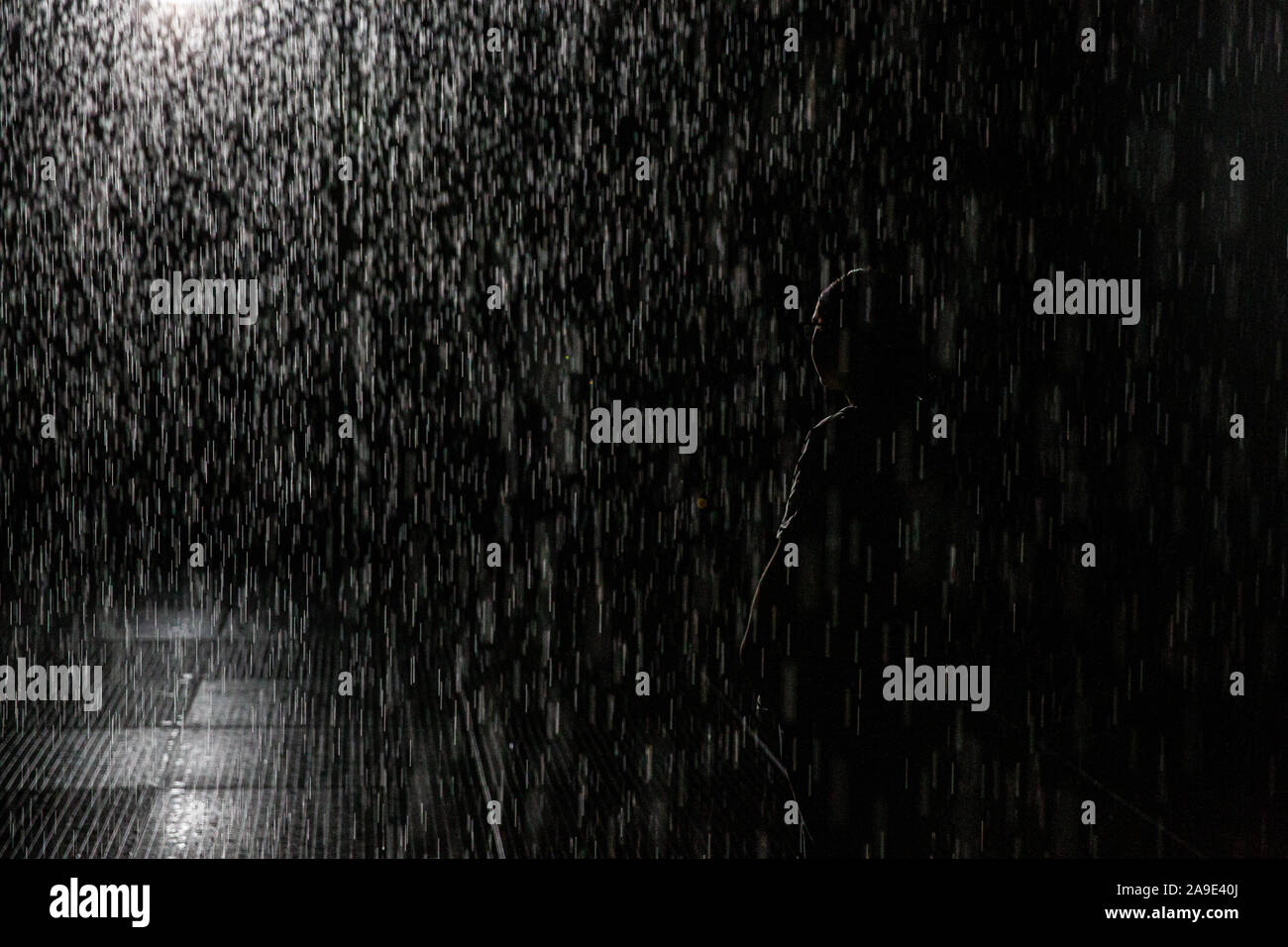 Woman Thinking In The Rain Room Installation Melbourne