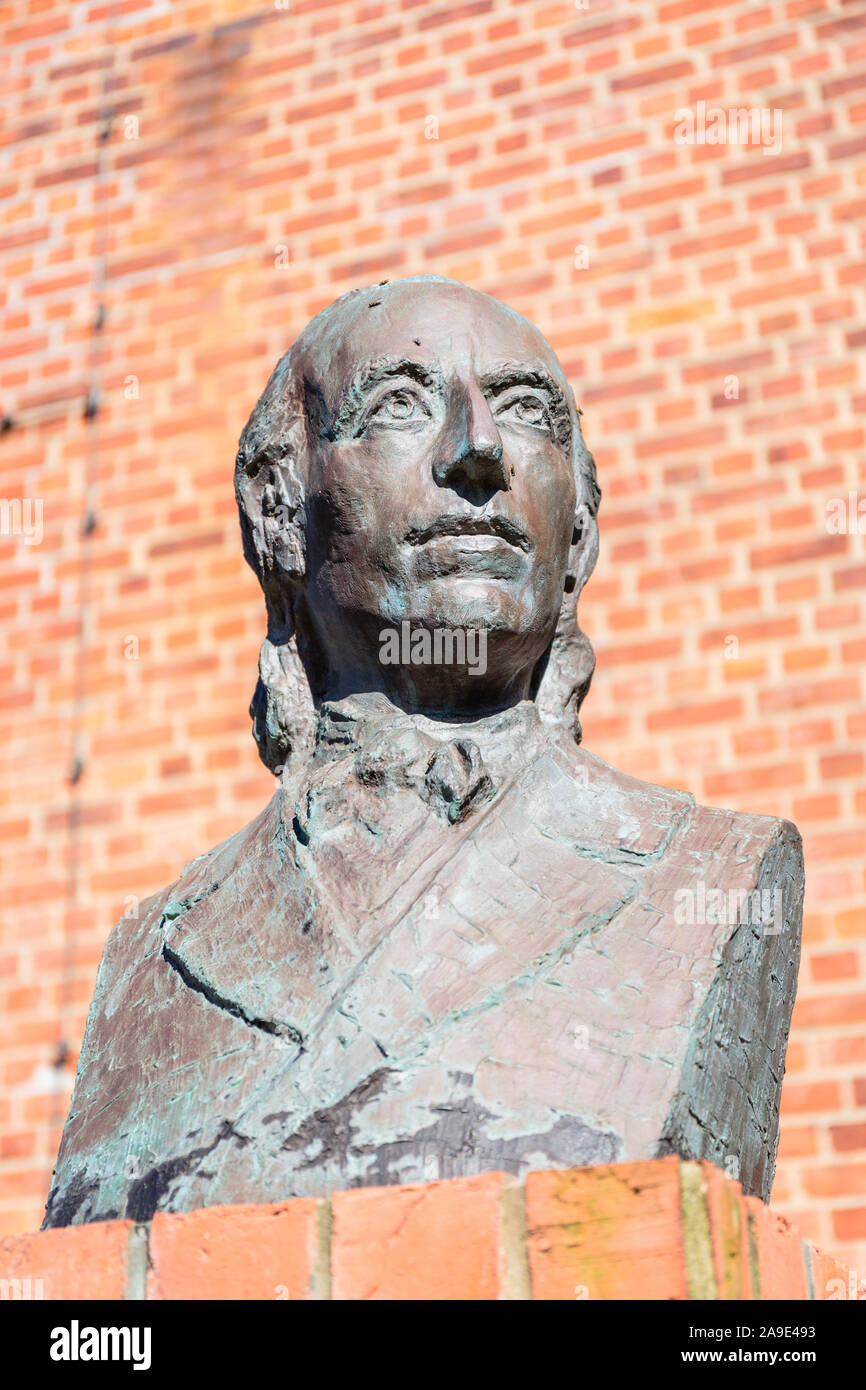 Europe, Germany, Lower Saxony, Otterndorf. Bust of Johann Heinrich Voss (1751-1826) in front of the Severi church. Stock Photo
