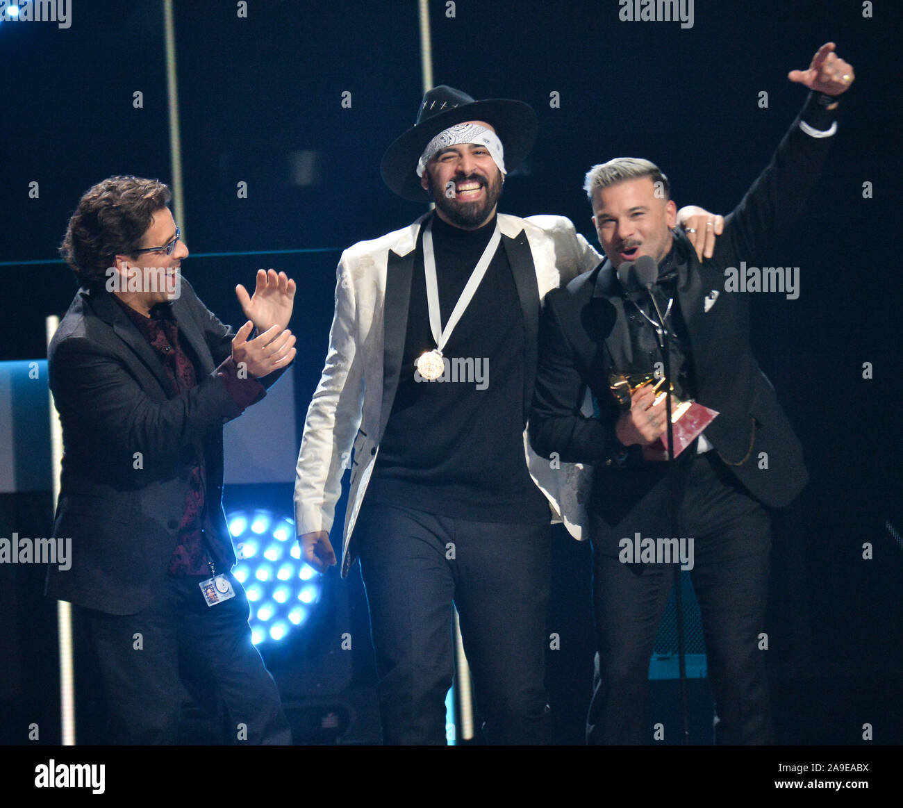 Las Vegas, United States. 14th Nov, 2019. (L-R) George Noriega, Gabriel Edgar González Pérez and Pedro Capo accept their Song of the Year award during the 20th annual Latin Grammy Awards honoring Columbian singer Juanes at the MGM Grand Convention Center in Las Vegas, Nevada on Thursday, November 14, 2019. Photo by Jim Ruymen/UPII Credit: UPI/Alamy Live News Stock Photo