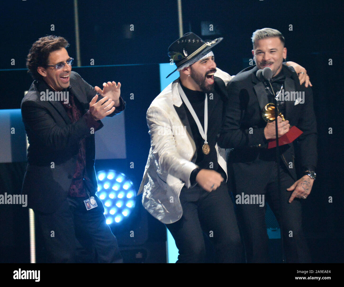 Las Vegas, United States. 14th Nov, 2019. (L-R) George Noriega, Gabriel Edgar González Pérez and Pedro Capo accept their Song of the Year award during the 20th annual Latin Grammy Awards honoring Columbian singer Juanes at the MGM Grand Convention Center in Las Vegas, Nevada on Thursday, November 14, 2019. Photo by Jim Ruymen/UPII Credit: UPI/Alamy Live News Stock Photo