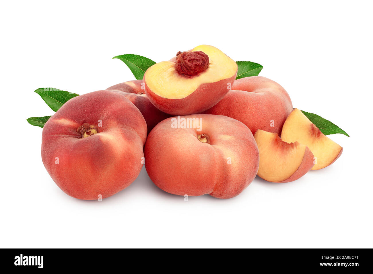 Ripe chinese flat peach fruit and half with leaf isolated on white