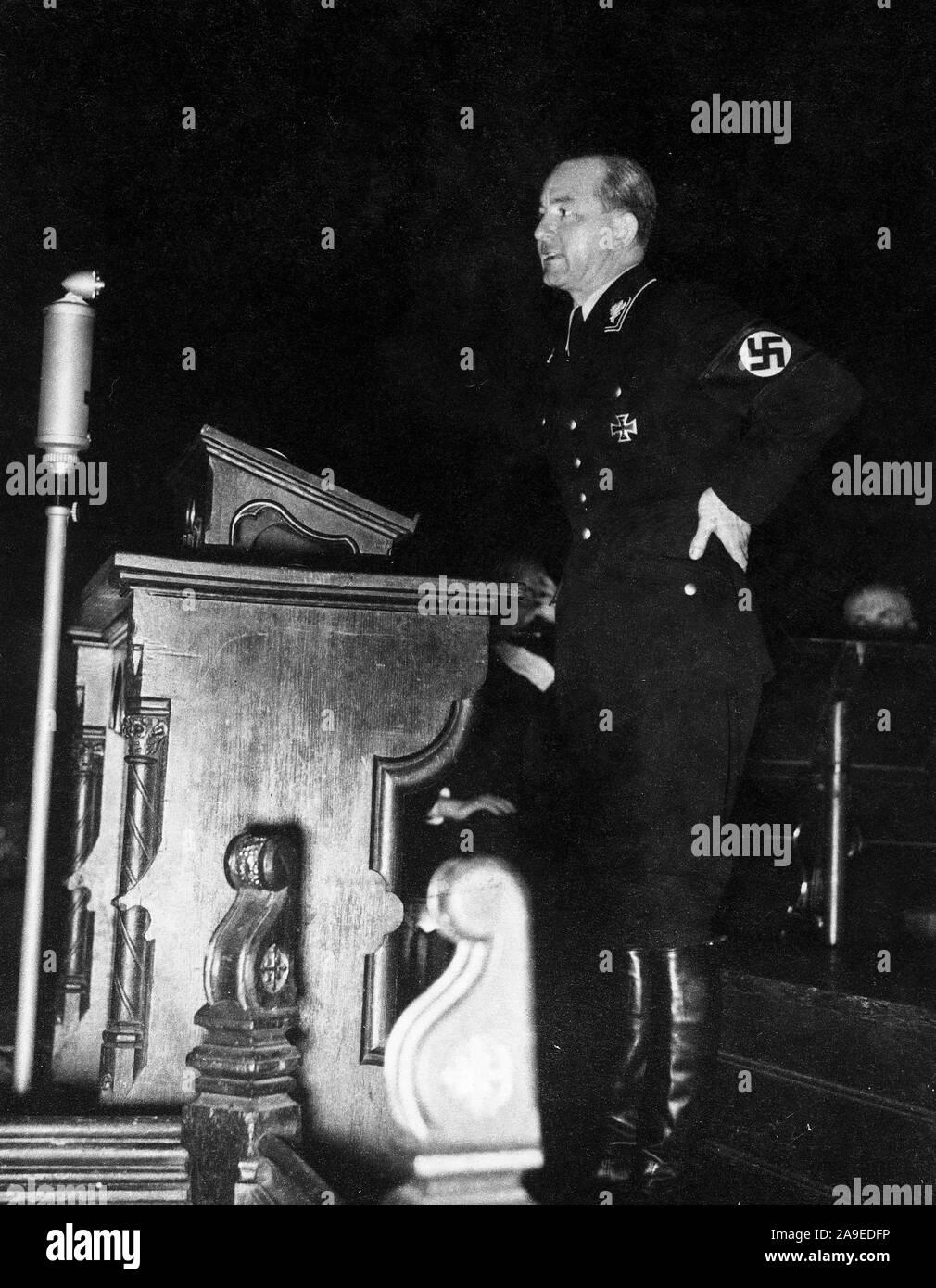Eva Braun Collection (album 4) - Nazi officer standing at what appears to be a church lectern ca. late 1930s or early 1940s Stock Photo
