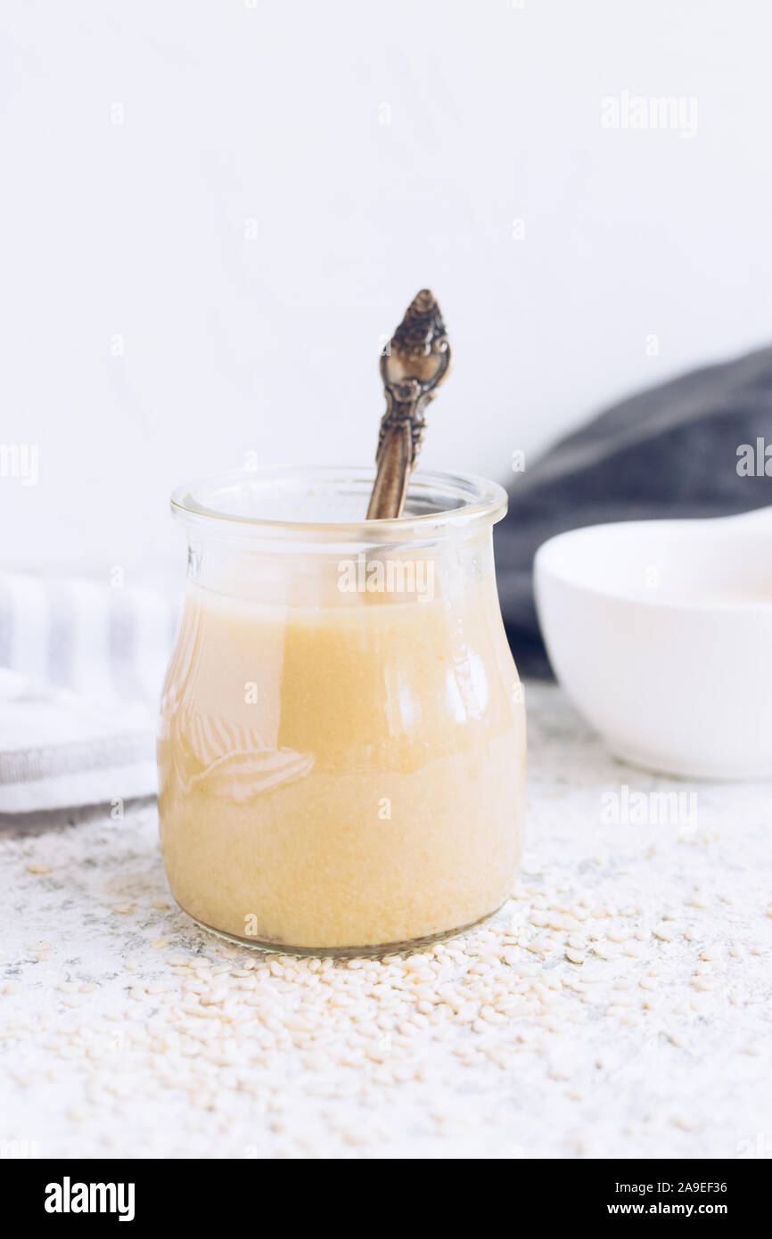Homemade tahini or tahina, paste from ground sesame seeds. Oriental