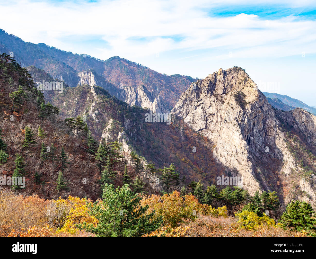 travel to South Korea - rocks and overgrown mountain slope in Seoraksan National Park in South Korea in autumn Stock Photo