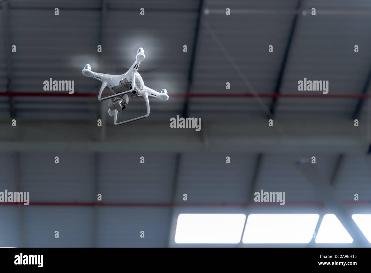 Drone camera surveying over a smart factory using internet of things Stock Photo