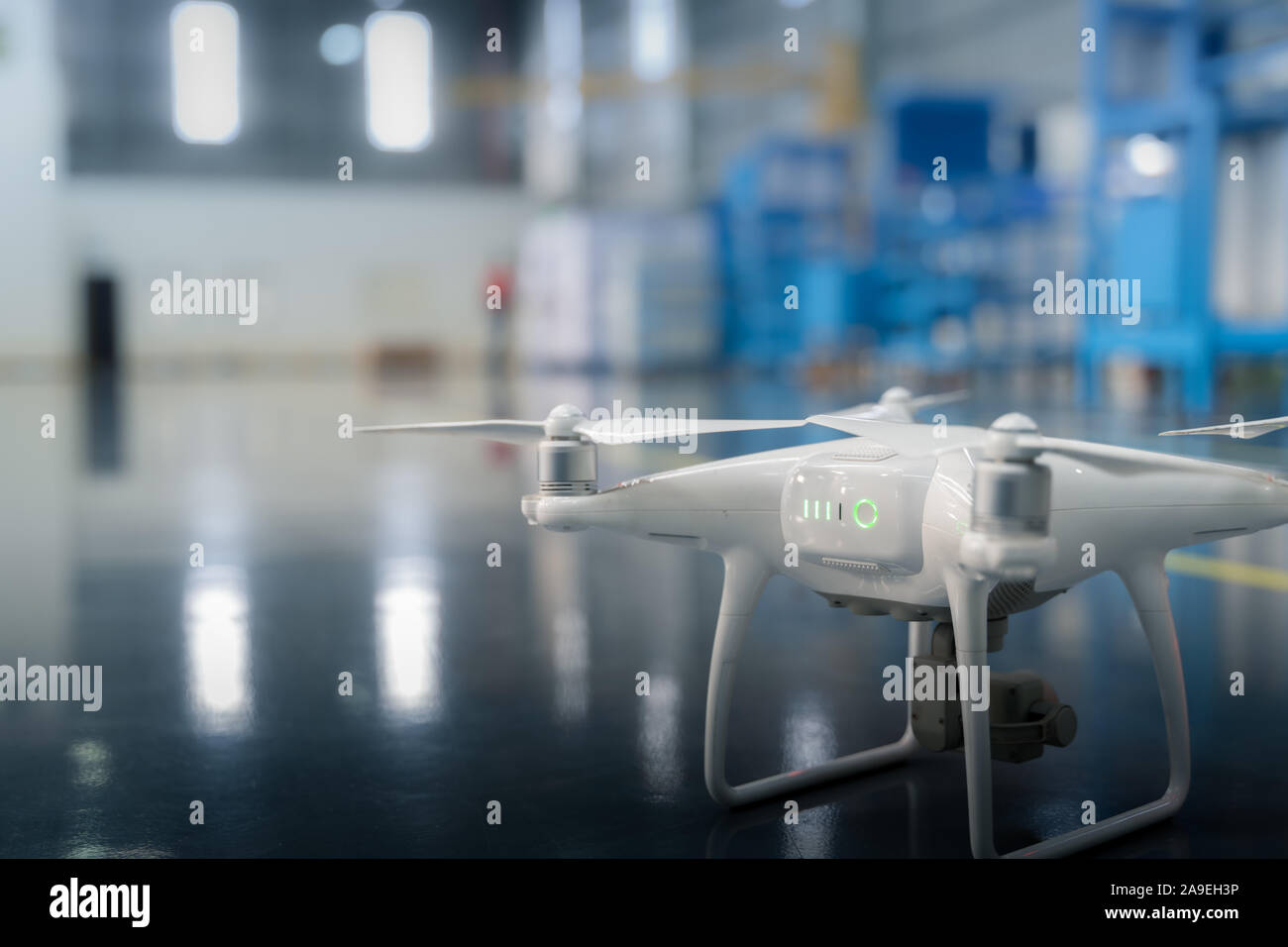 Drone camera surveying over a smart factory using internet of things Stock Photo