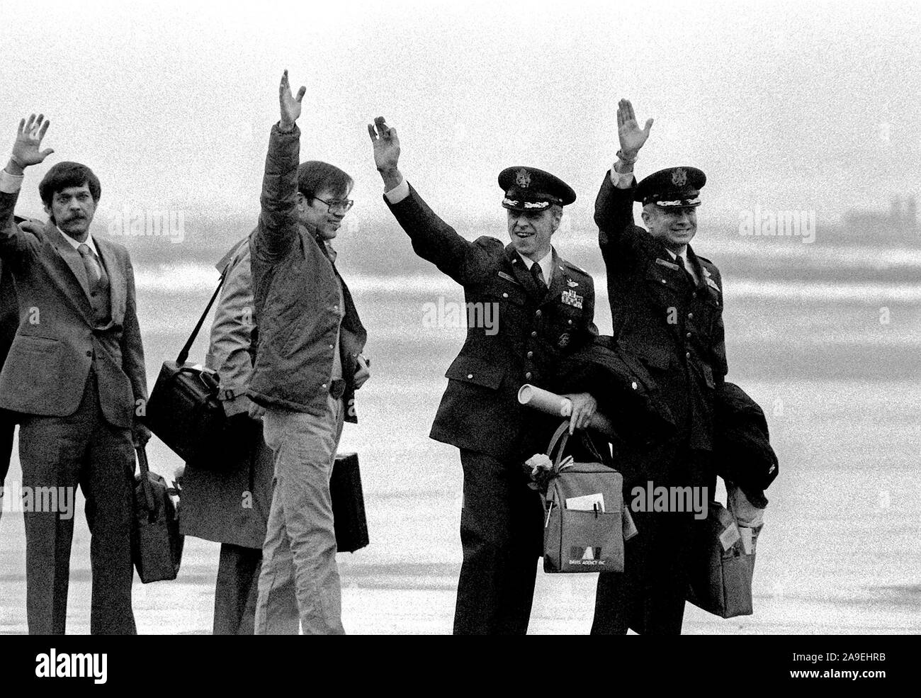 Former hostages Allan B. Golacinski, Clair Barnes, LTC David Roeder and COL Thomas Shaffer, left to right, arrive at the base for their departure to the United States.  The 52 hostages were hospitalized for a few days after their release from Iran. Stock Photo