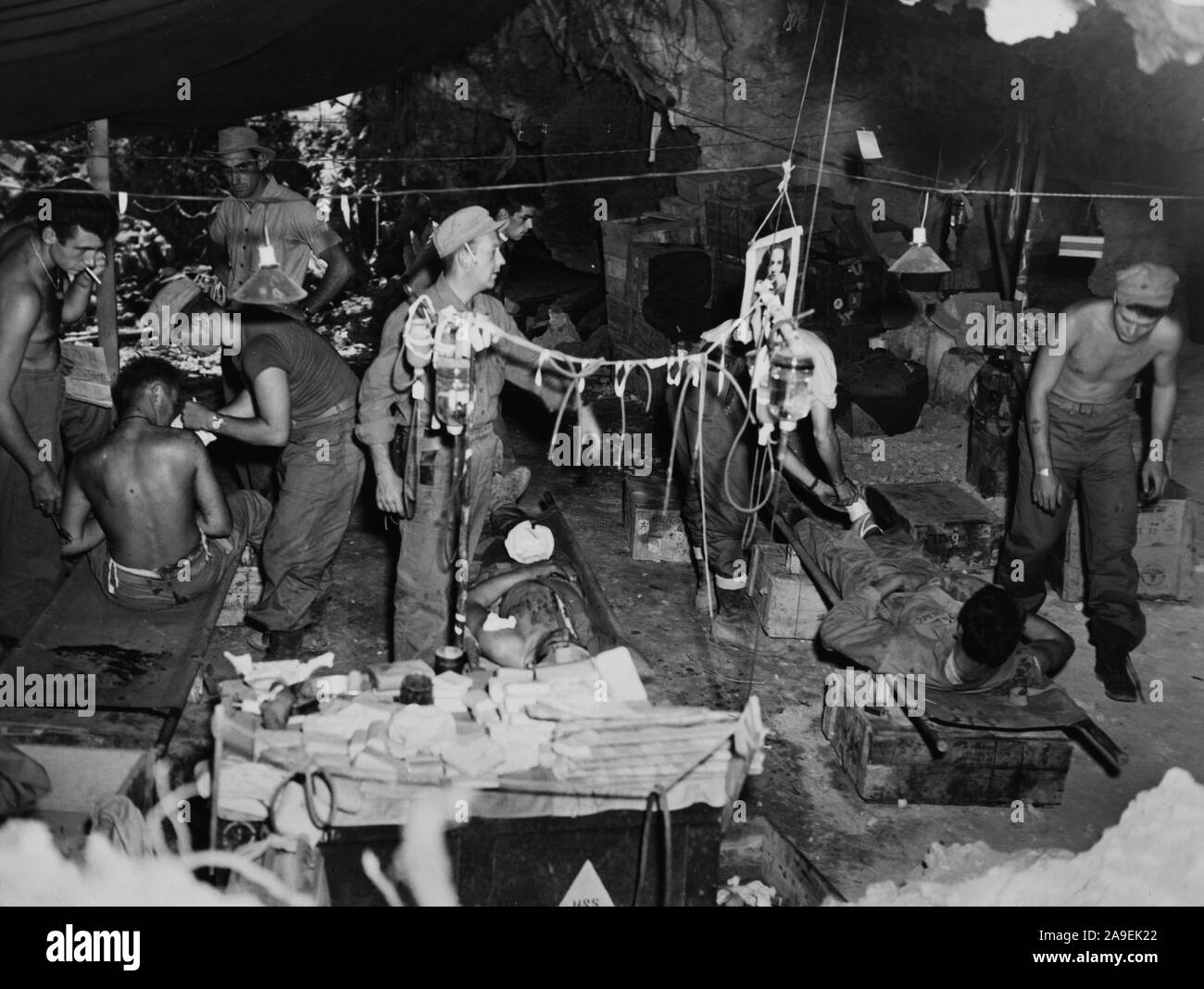 Wounded of first marine division on Okinawa at collection point being given blood and plasma Stock Photo