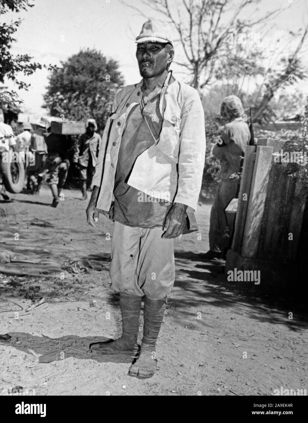 Japanese soldier on Saipan with all fight knocked out of him works around captured hosptial Stock Photo