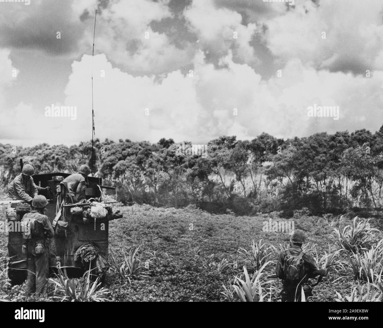 Half track with 75mm gun and machine guns have Japanese crowded into southern tip of Tinian Island Stock Photo
