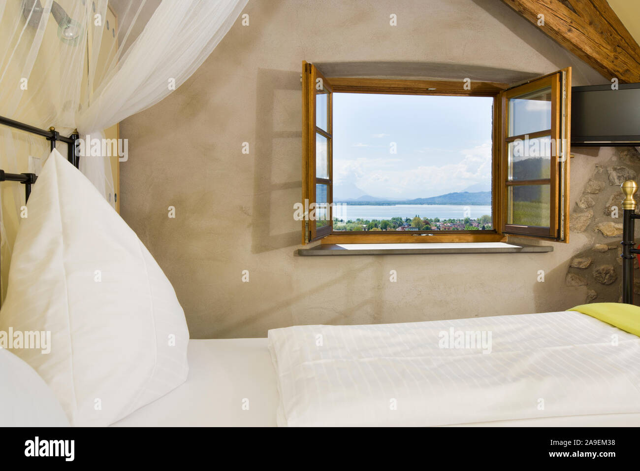 Bedroom with open window Stock Photo - Alamy