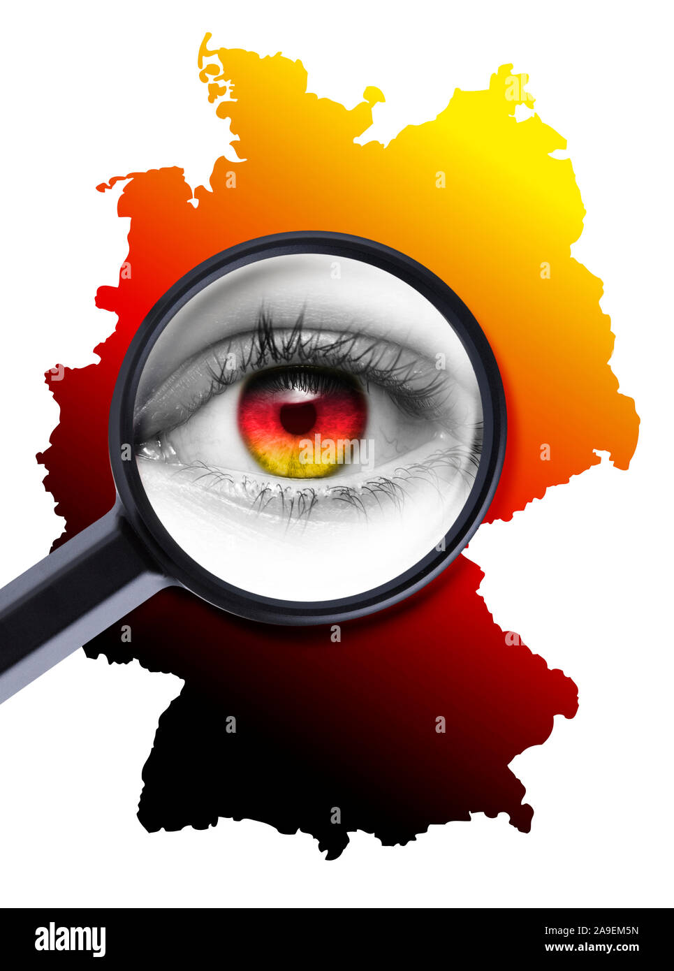 Eye under the magnifying glass in front of Germany Stock Photo
