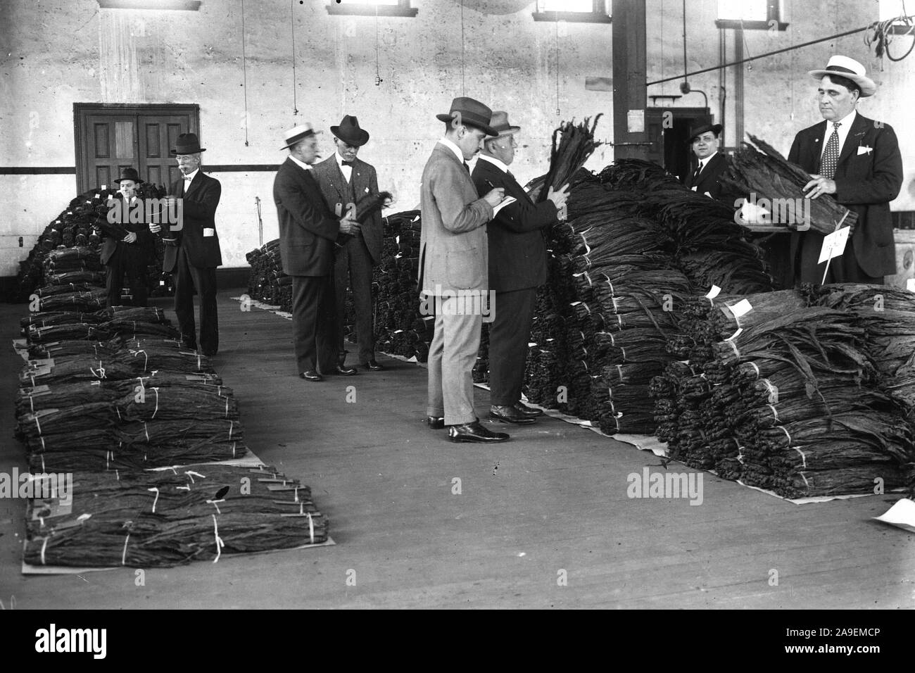 The sale was held at the old tobacco exchange at Richmond, VA. The photograph shows prospective buyers on the scene of the sale. This is the first public sale of enemy property by the Alien Property Custodian, May 20, 1918. Stock Photo