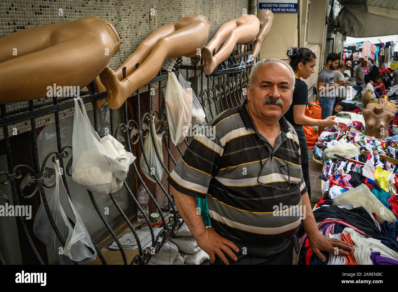 Man and his mannequins at his clothing stand in the Fatih Market