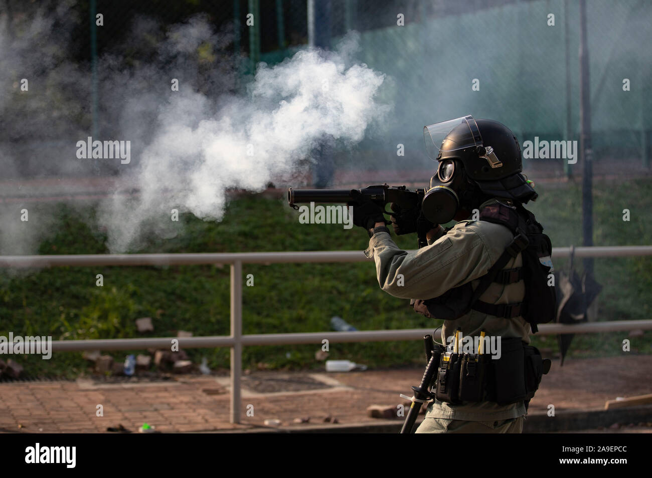 Police fire teargas during the crack down. An unprecedented battles at Chinese University Hong Kong (CUHK).  Hong Kong protest continuous on its fifth months. A citywide strike called for started on Monday 11 November, 2019 which brought parts of Hong Kong to halt as MTR stations closed and multiple roadblocks were erected. Hong Kong, 12.11.2019 Stock Photo