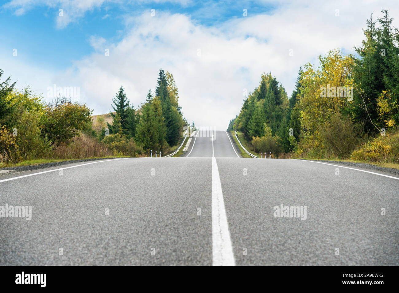 Empty asphalt road in mountains Stock Photo