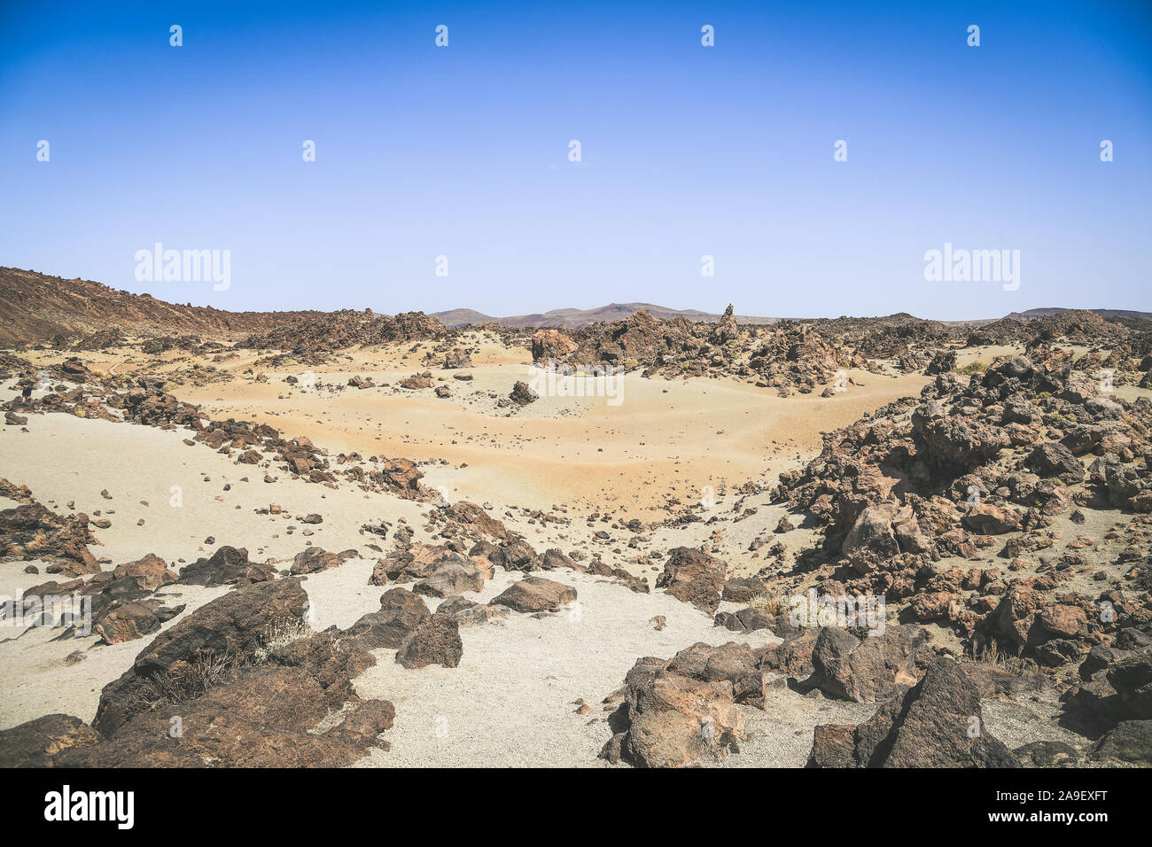 Panorama view of the Teide National Park. Rocks of volcanic origin and sand in Tenerife island, Canary Islands in Spain. Desert lunar landscape withou Stock Photo