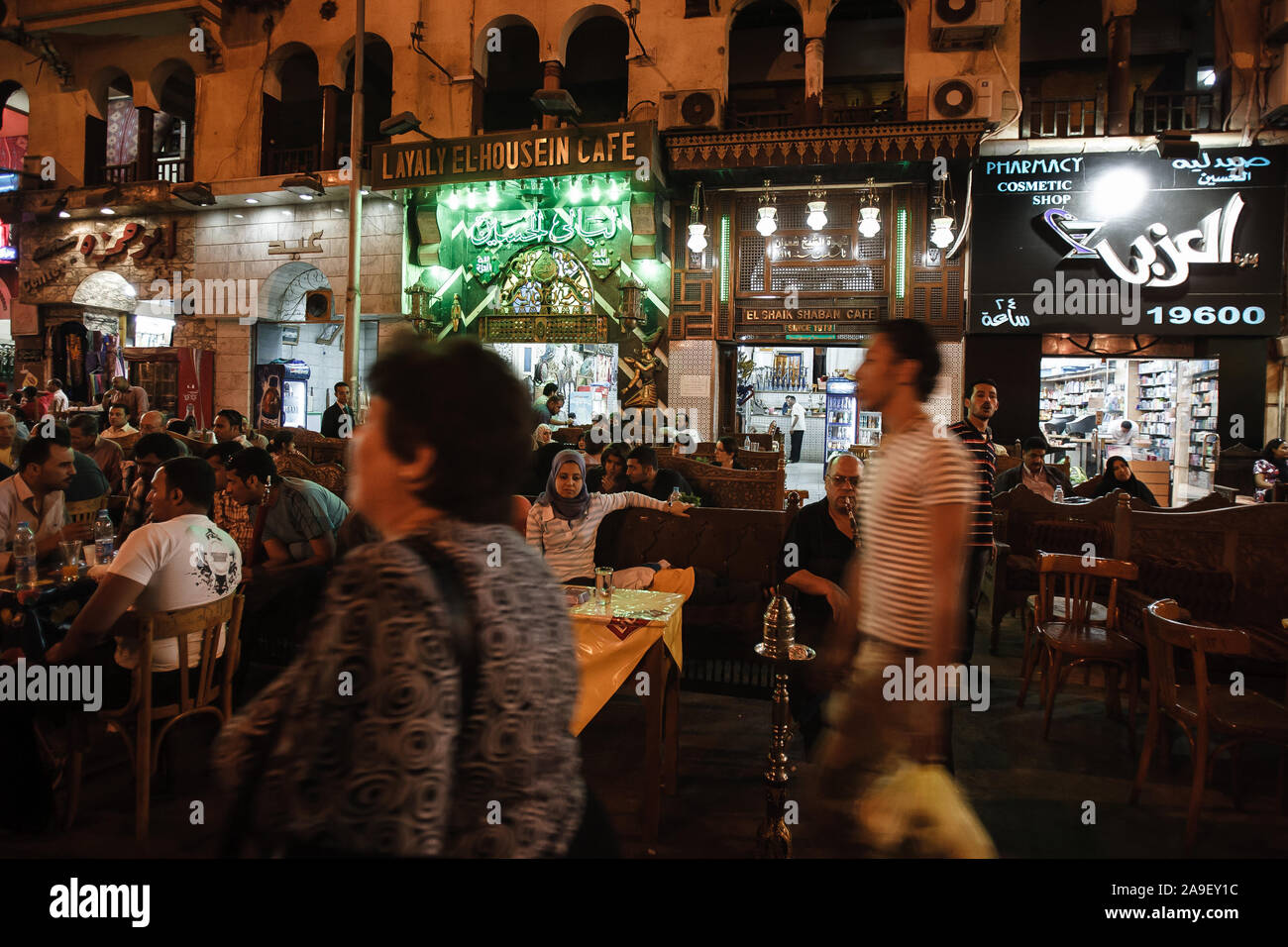 Cairo, Egypt, May 2, 2008: People sit outside bars and shops in the Khan el-Khalili bazaar district of Cairo. Stock Photo