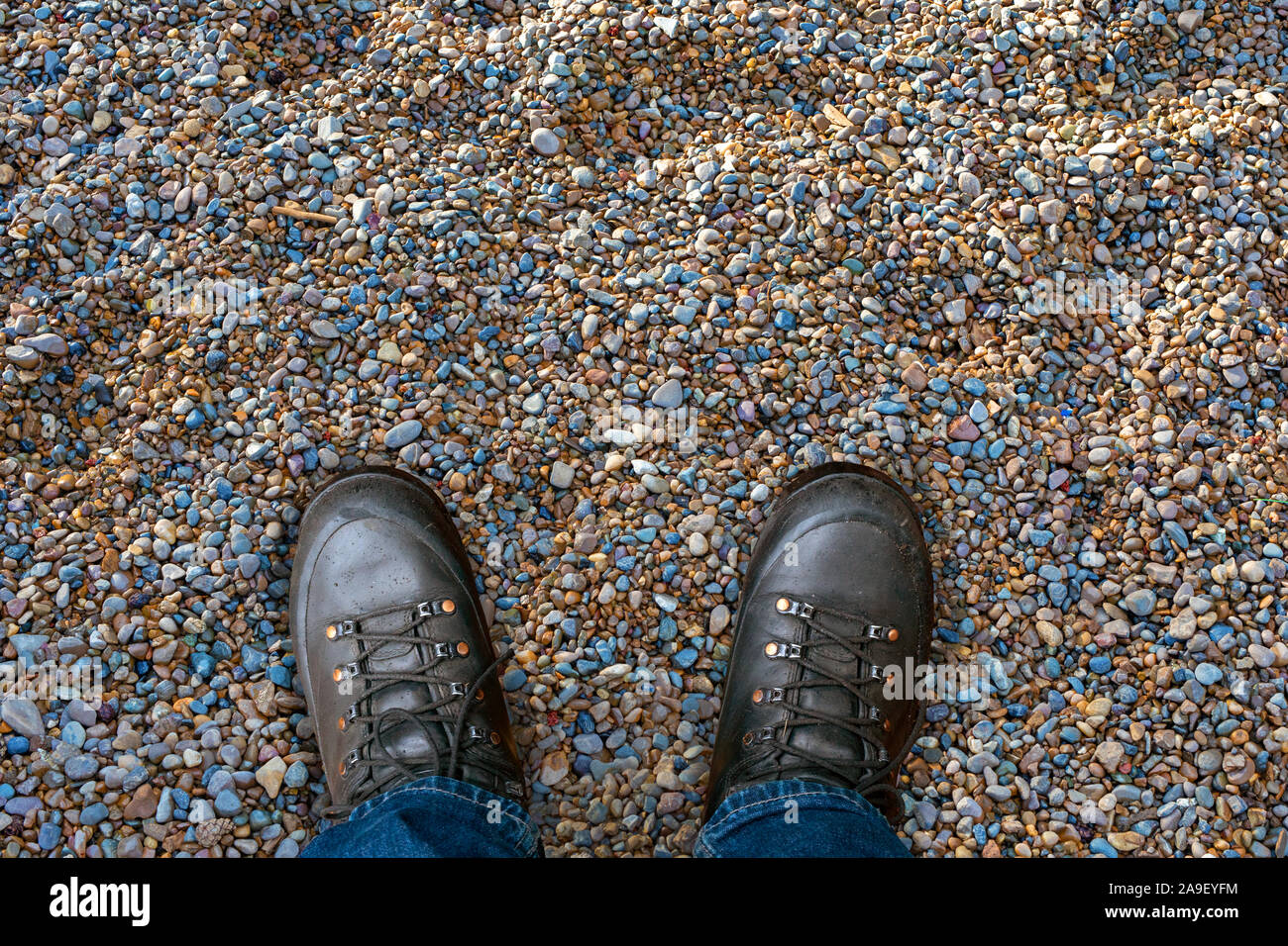 male legs and shoes top view. Selfie feet in black leather tracking