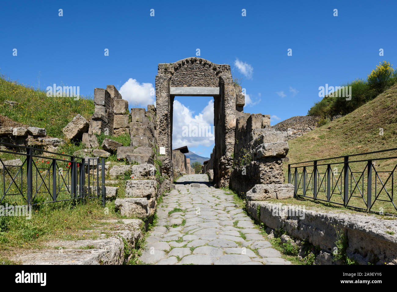 Pompei. Italy. Archaeological site of Pompeii. Porta Nocera (Nuceria Gate) and remains of the defensive walls (cinta muraria).  The Nocera gate provid Stock Photo