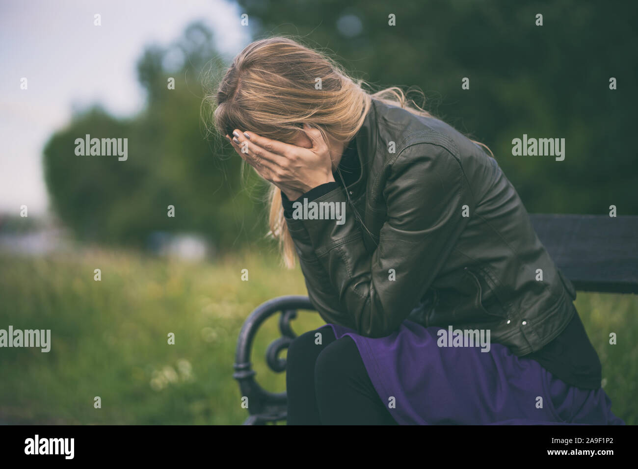 Portrait of lonely and depressed woman in grief. Stock Photo