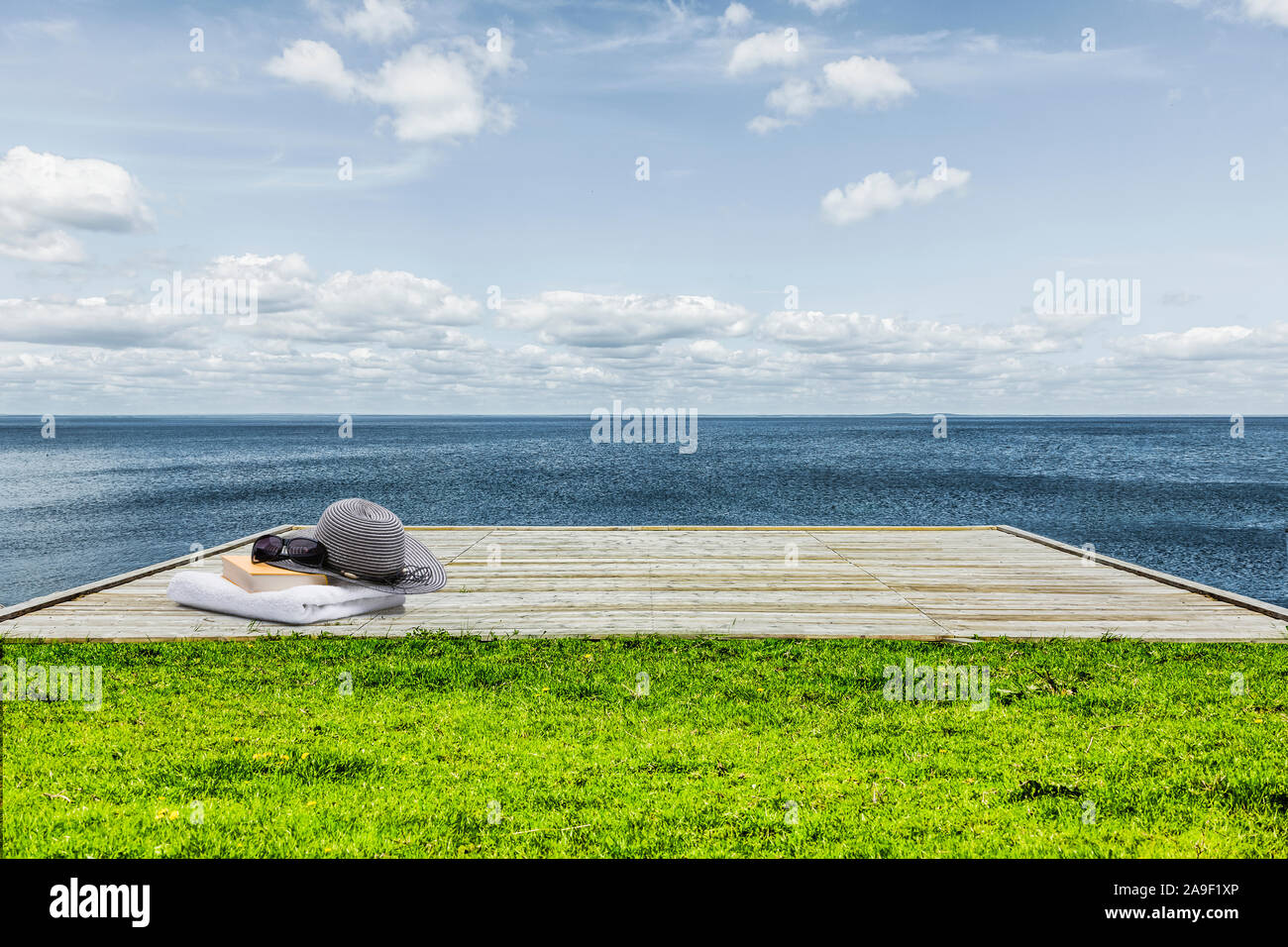 Wooden Terrace By The Sea With Book Stock Photo Alamy