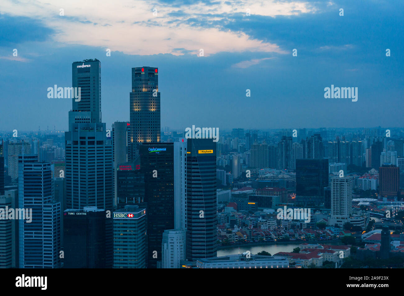 Singapore, Singapore - August 24, 2013: Aerial view of Singapore CBD cityscape at dusk Stock Photo