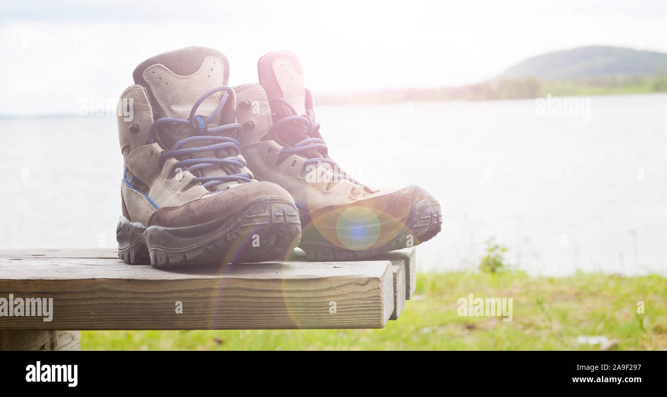 Hiking boots in backlight Stock Photo