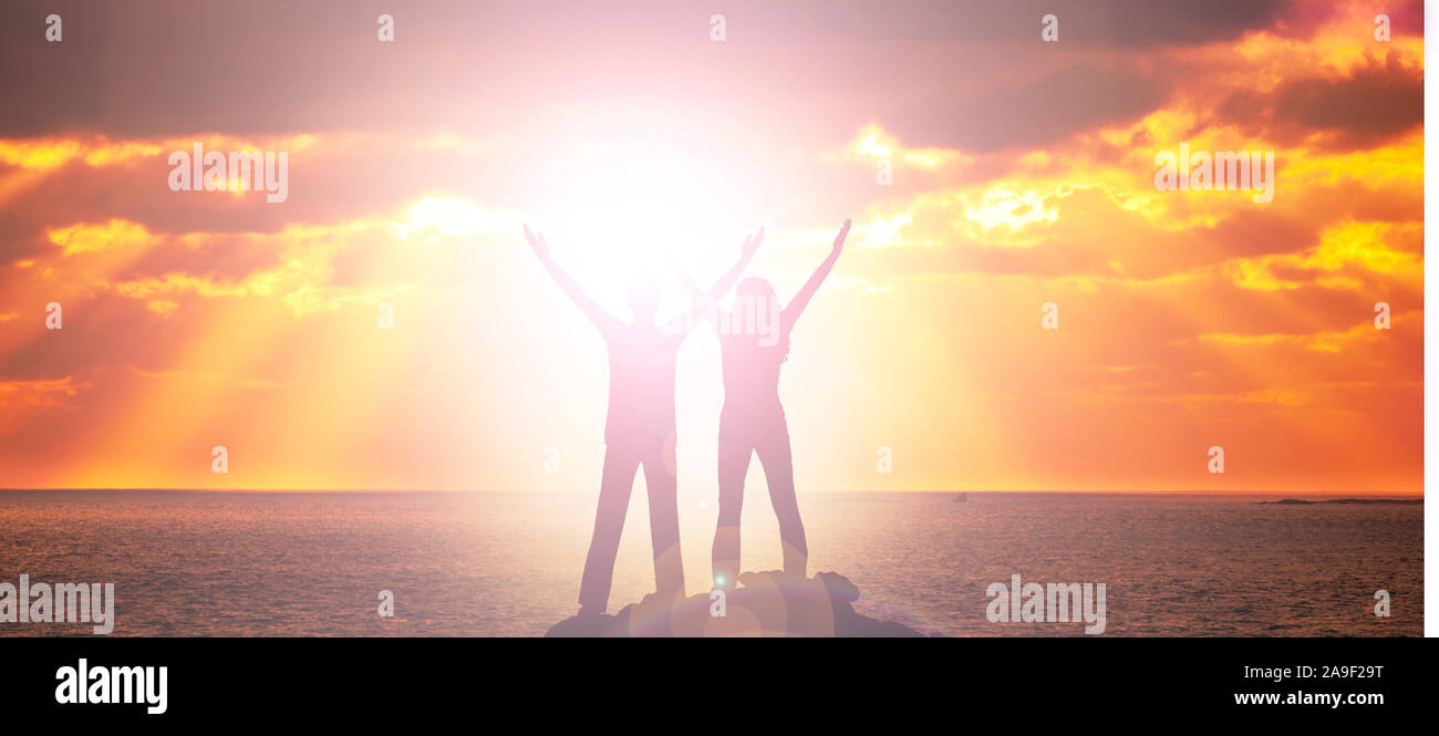 Man and woman at sunset Stock Photo