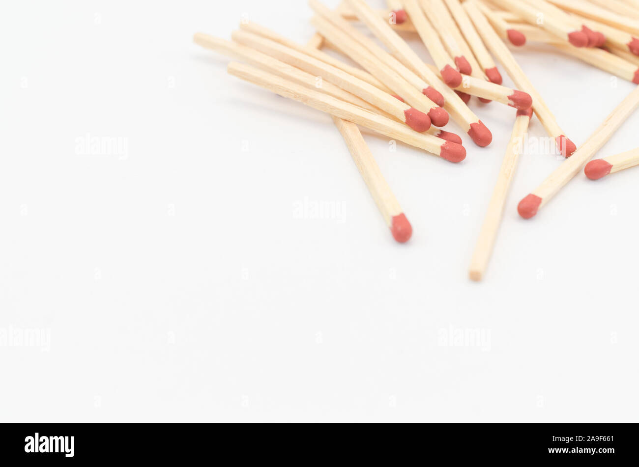 bunch of matches on a white surface Stock Photo