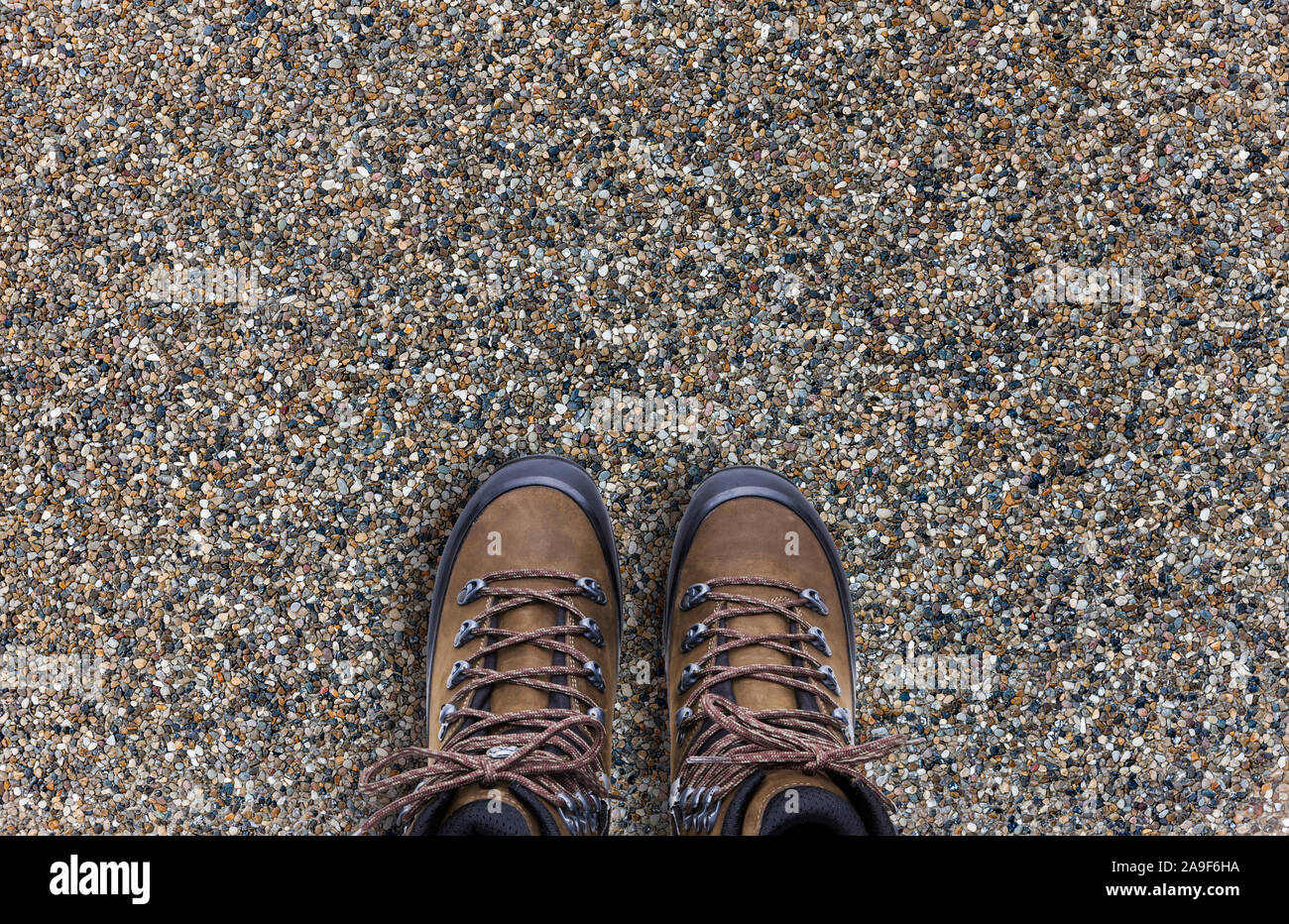 Mountain boots on stone floor Stock Photo