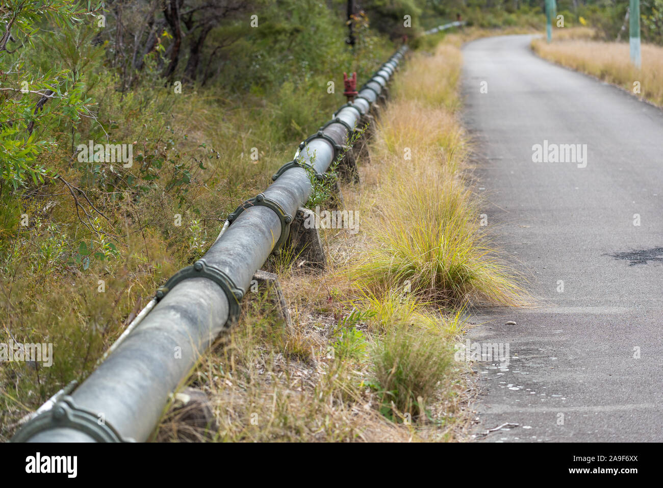Outdoor trunk pipeline with steel fittings. Rural infrastructure Stock