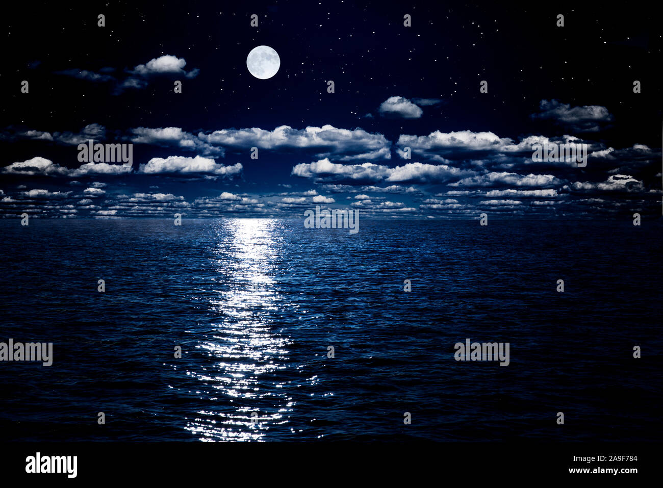 Full Moon Over Water Stock Photo Alamy