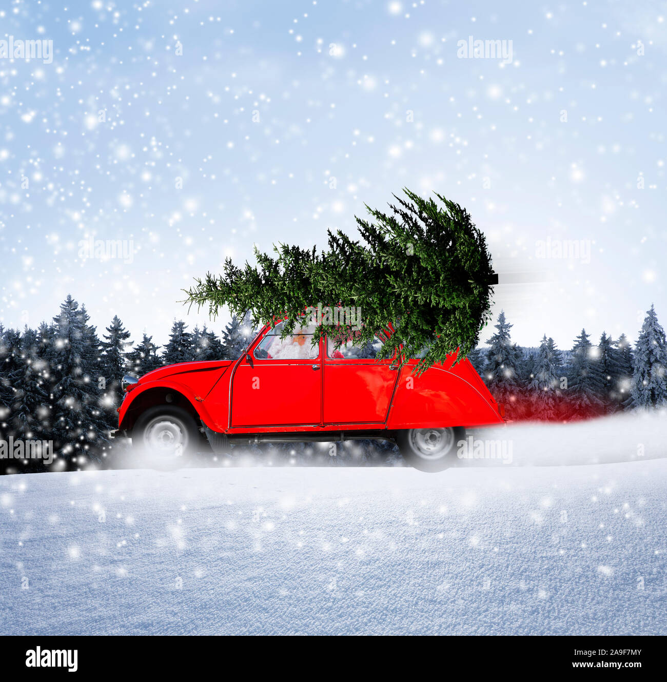 Christmas car with Christmas tree Stock Photo
