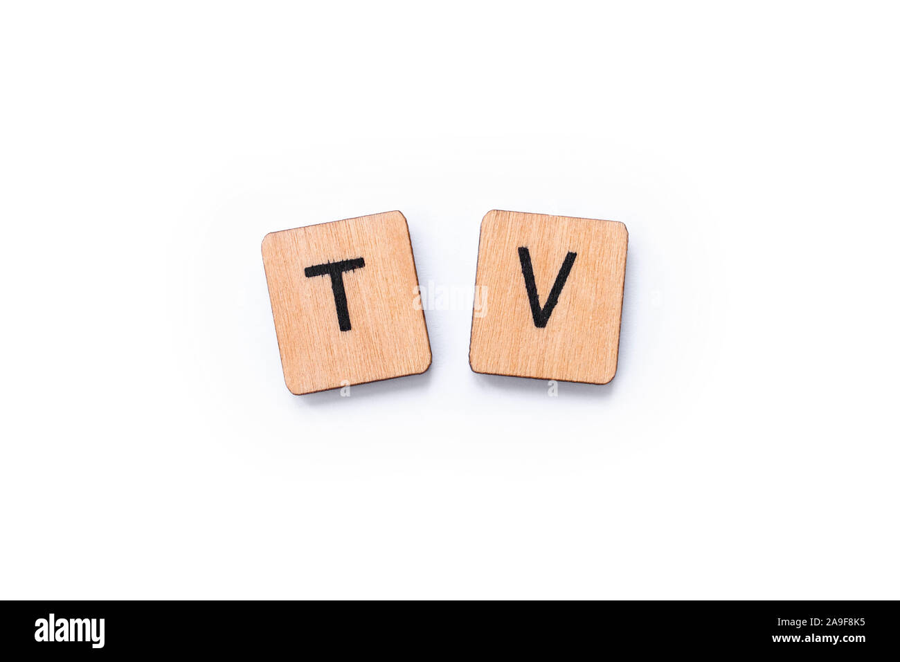 TV, the abbreviation for Television, spelt with wooden letter tiles over a  white background Stock Photo - Alamy