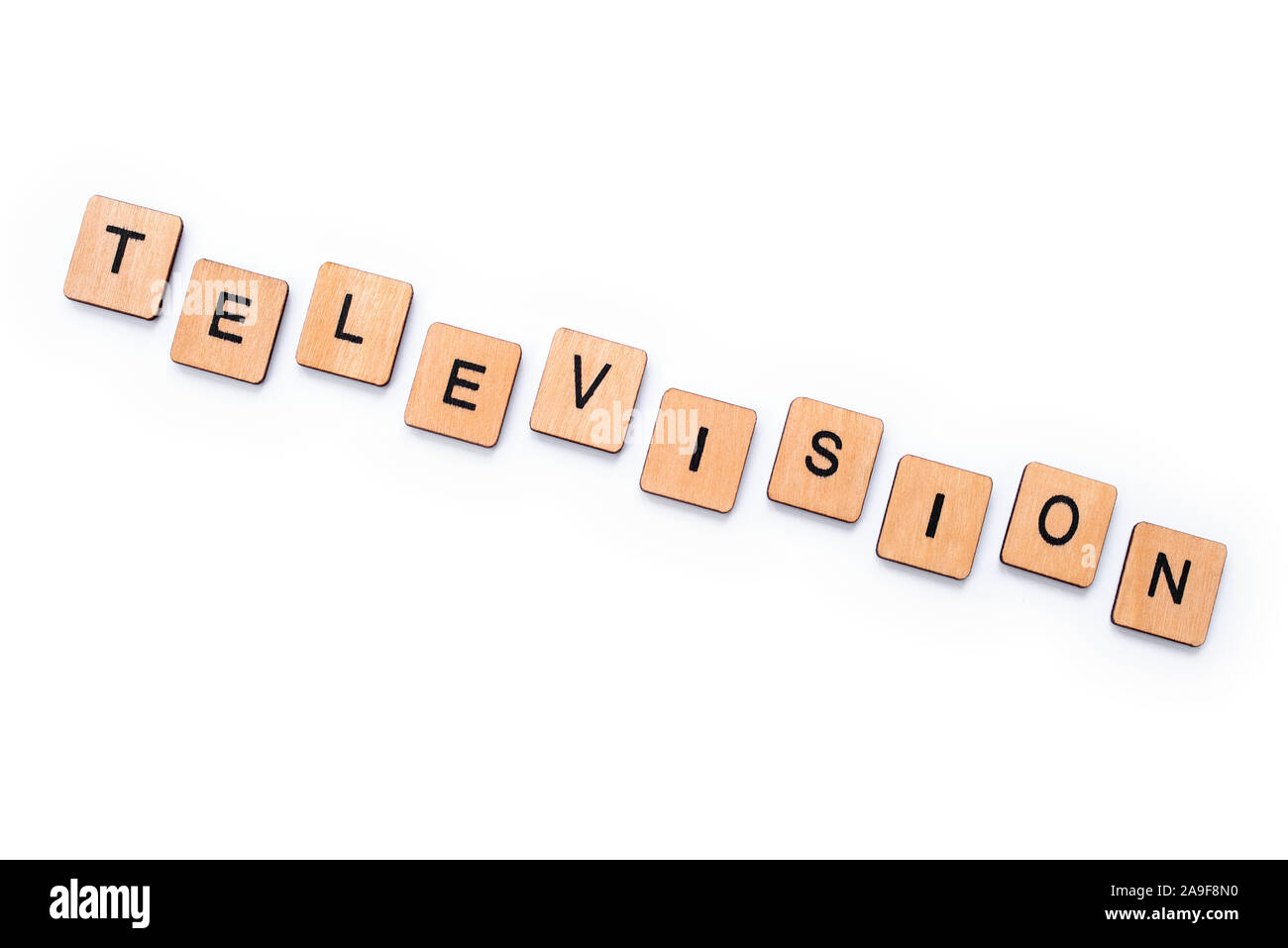 The word Television, spelt with wooden letter tiles over a white background Stock Photo Alamy