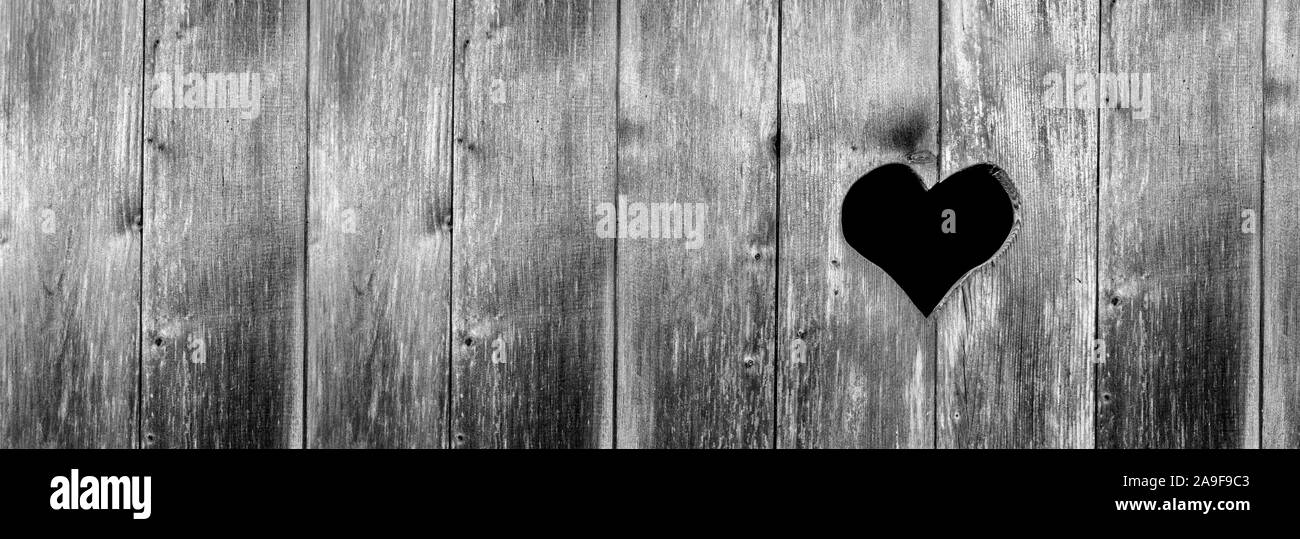 Heart in wooden wall Stock Photo