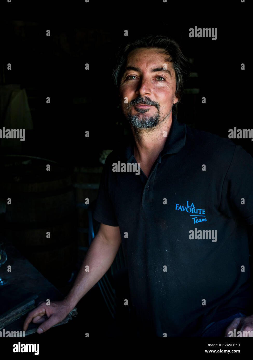 Habitation la Favorite, rum distillery, Franck Dormoy in the rum cellar, distillation with steam engine same as 100 years ago Stock Photo