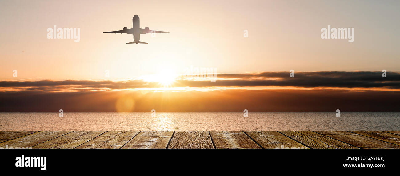 Flight in the sunset Stock Photo