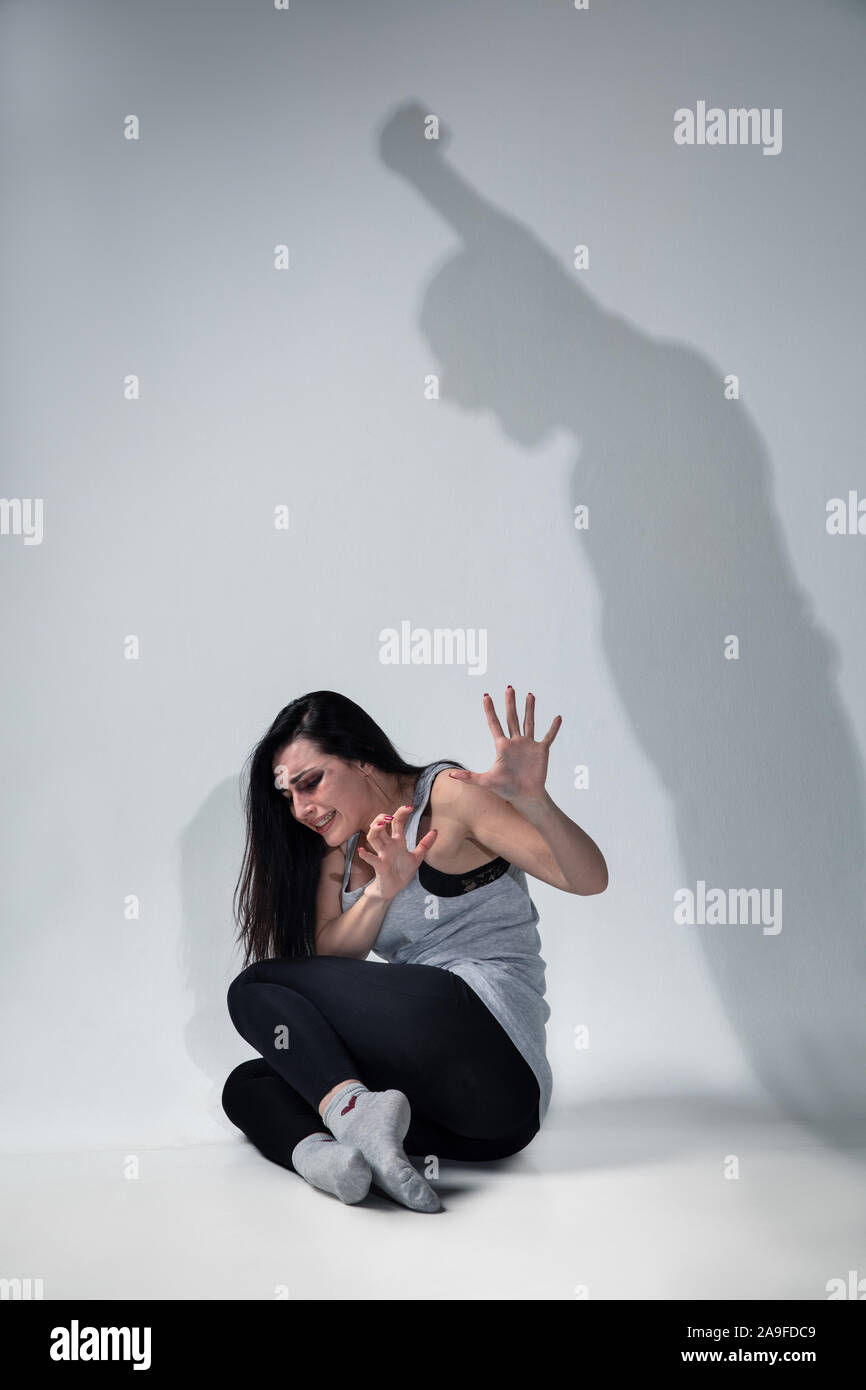 Woman in fear of domestic abuse, violence, concept of female rights