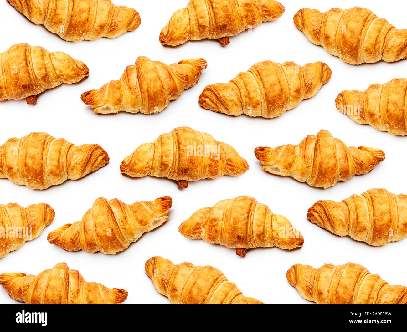 French croissants isolated on white background Stock Photo