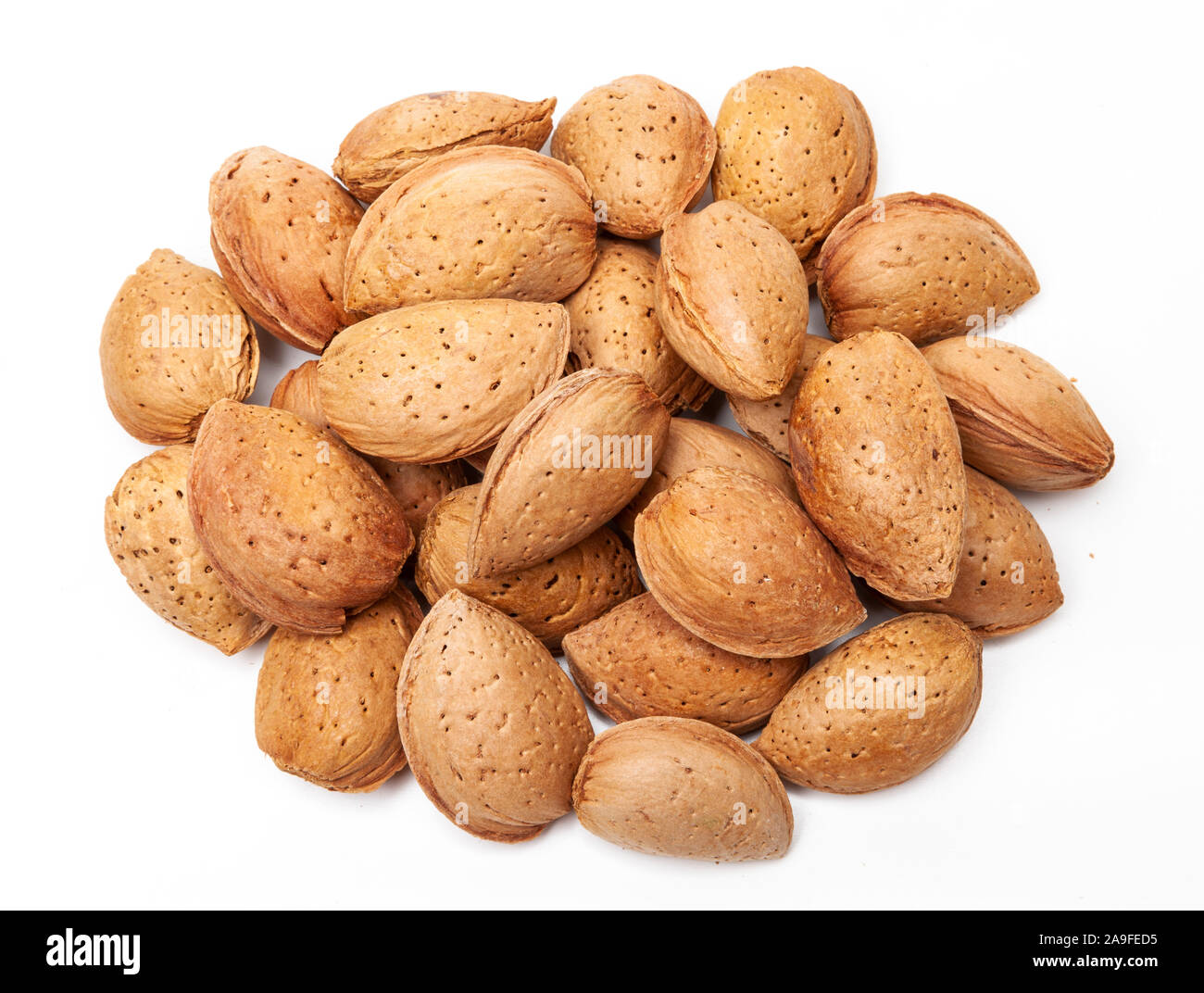 Almonds in the shell isolated on white background Stock Photo Alamy