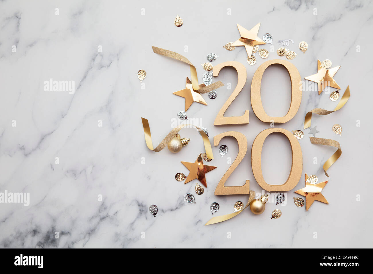 New year 2020 party gold decoration celebration background. Stock Photo