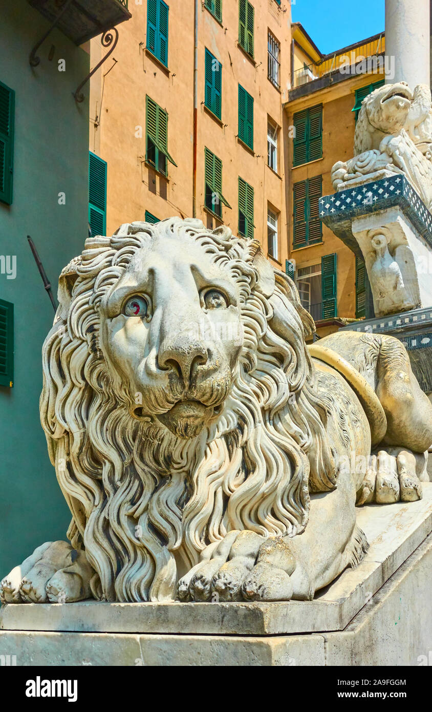 Lying marble lion - Statue at the entrance of San Lorenzo Cathedral in Genoa (Genova), Italy Stock Photo
