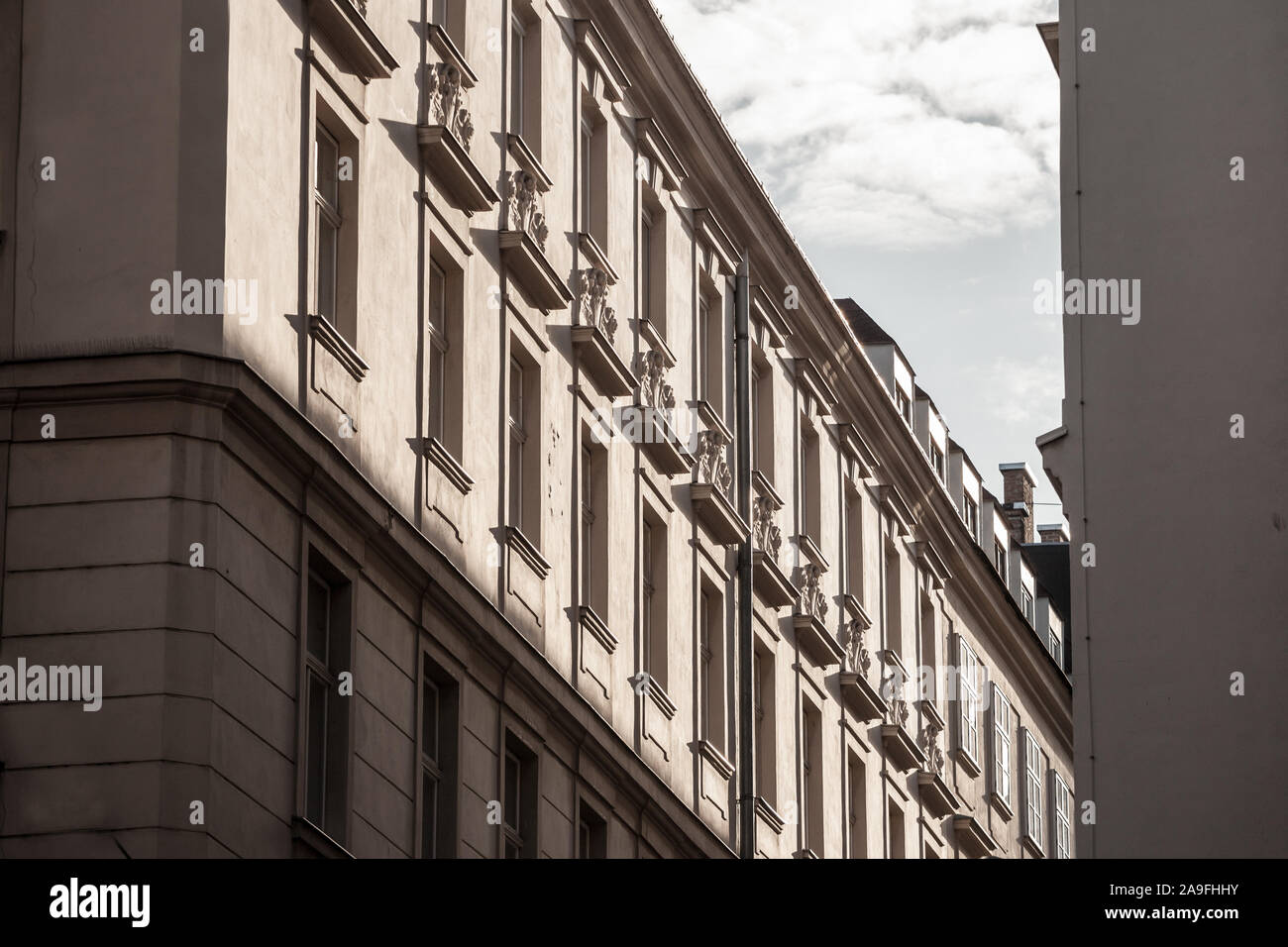 Typical Austro-Hungarian Facades wit old windows in a street of Innere Stadt, the inner city of Vienna, Austria, in the 1st Bezirk district of the Aus Stock Photo