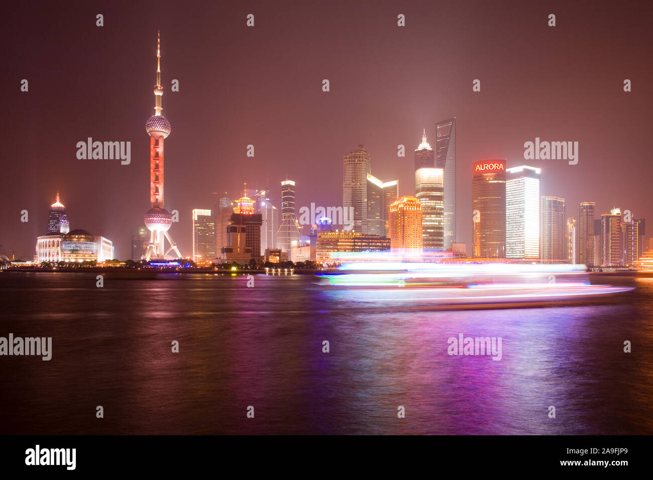 Shanghai, China - Skyline of Lujiazui and Pudong with the Oriental Pearl Tower, across the Huangpu river. Stock Photo