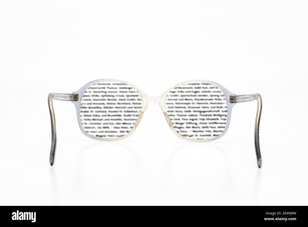 Old retro glasses, writing, symbol, reading, reading glasses Stock