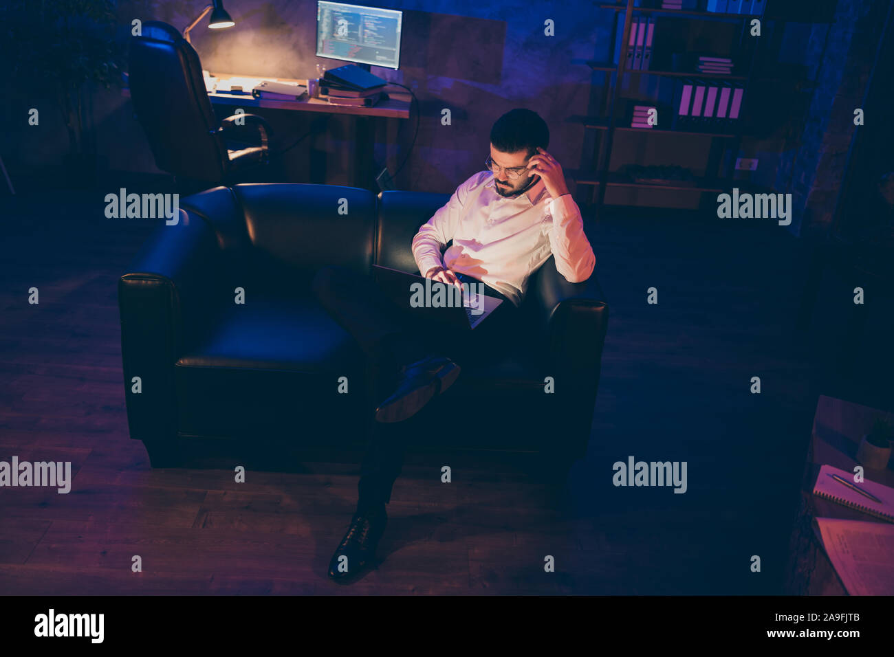 Man Fixed On Computer Screen Full length body size photo of pensive interested man looking pensively ...